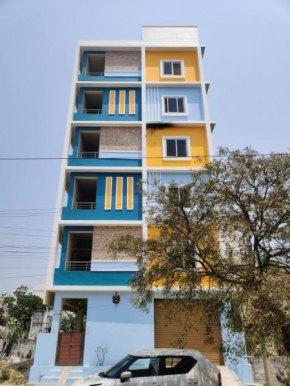 RAK Homestay - Luxury AC 2BHK Apartments for family stay - Walkable to PS4 restaurants -Equipped Kitchen - WIFI - Android TV - Near to Tirumala fly over starting point -Near to National Highway